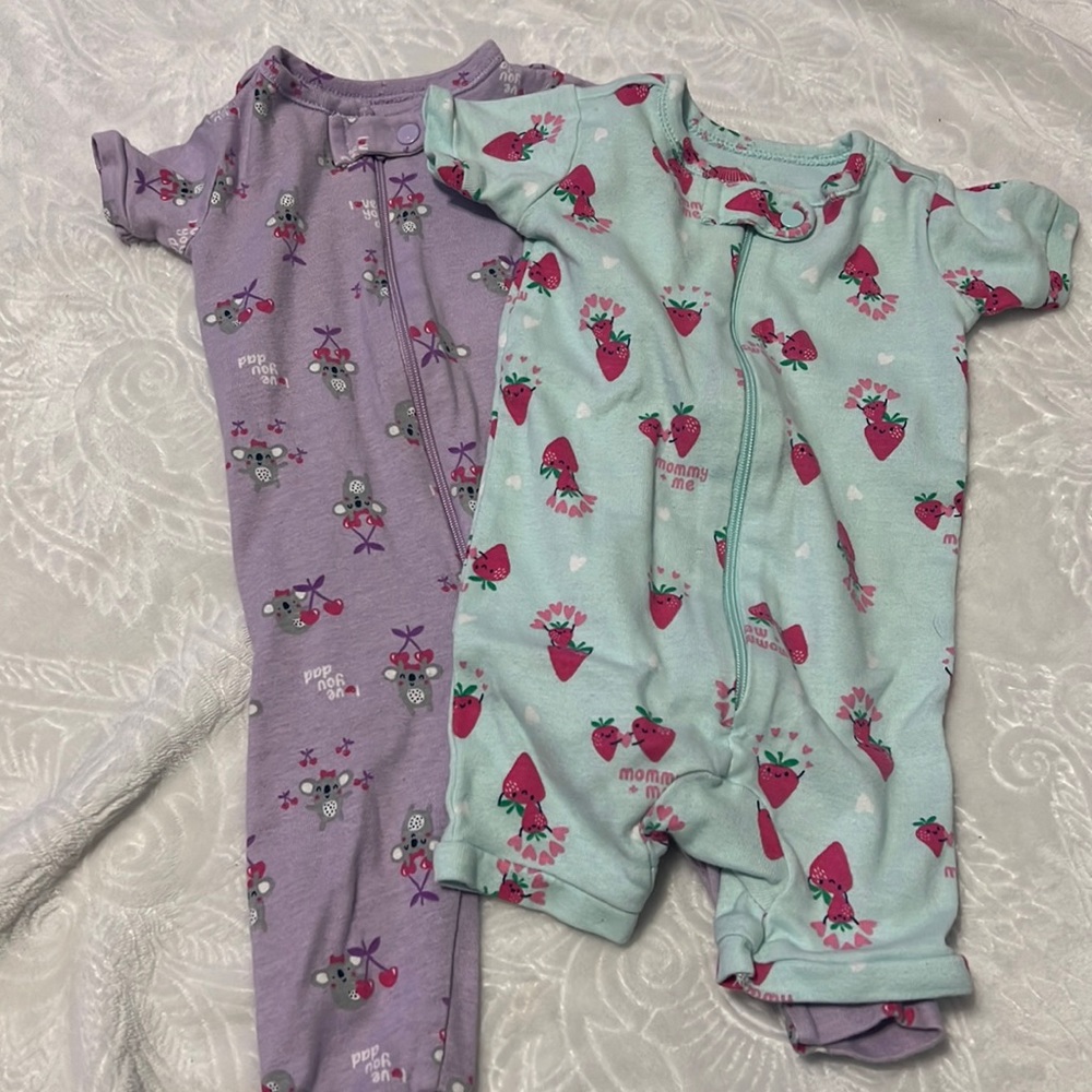 Infant 0-3 month sleeper onesies.